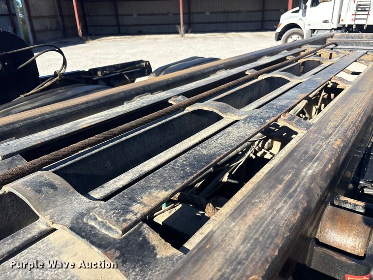 image for item EM6122 2025 Mack GR64F roll-off container truck