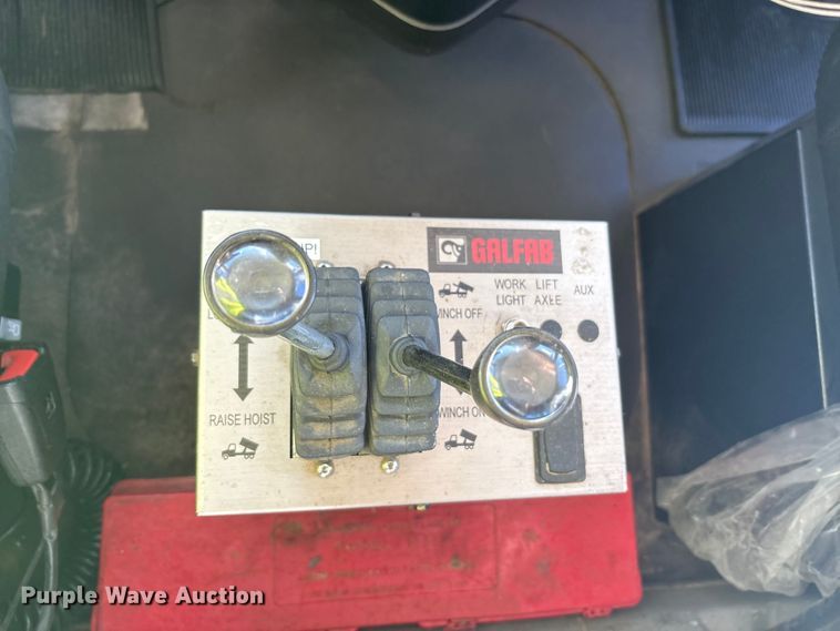 image for item EM6122 2025 Mack GR64F roll-off container truck