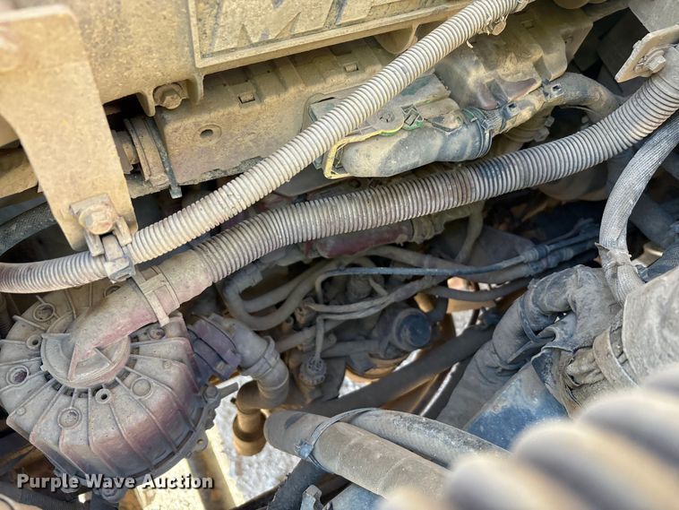 image for item EM6122 2025 Mack GR64F roll-off container truck