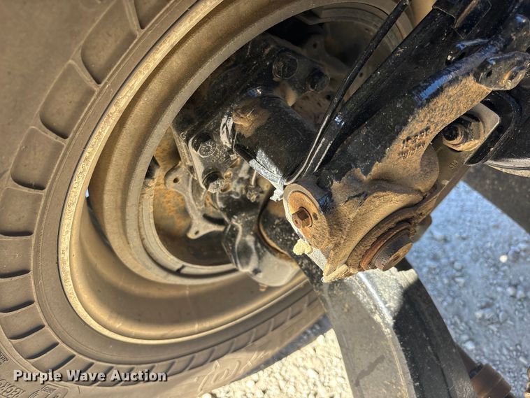 image for item EM6122 2025 Mack GR64F roll-off container truck