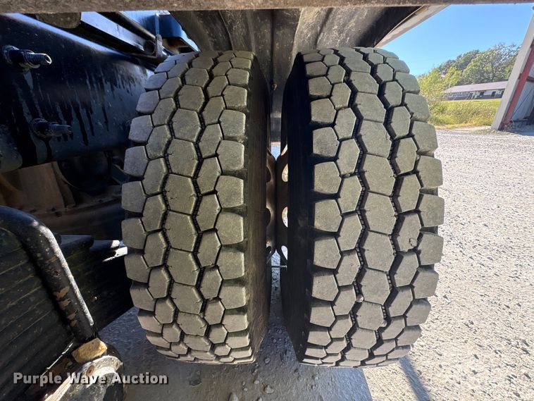 image for item EM6122 2025 Mack GR64F roll-off container truck