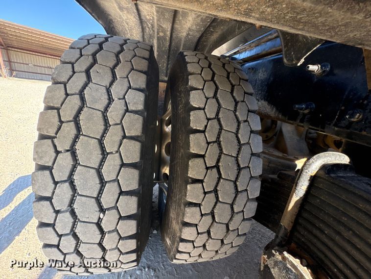 image for item EM6122 2025 Mack GR64F roll-off container truck