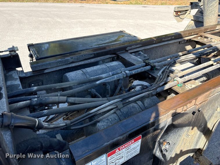 image for item EM6124 2025 Mack Granite roll-off container truck