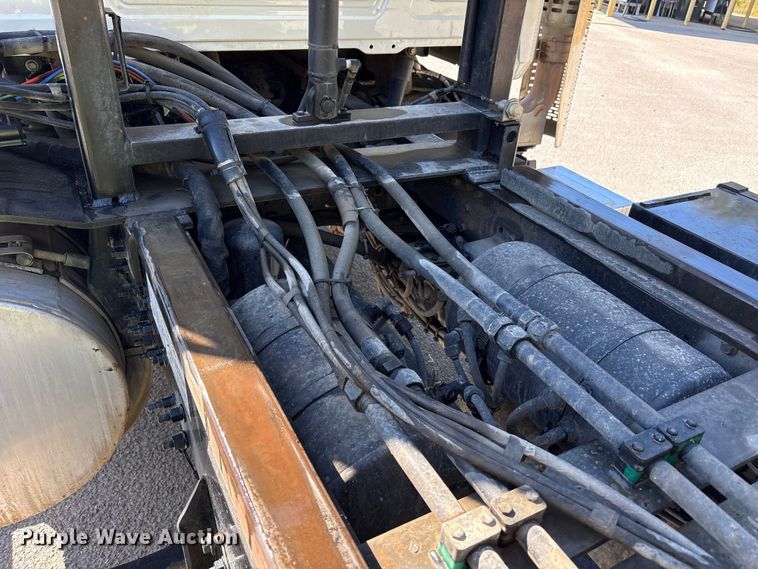 image for item EM6124 2025 Mack Granite roll-off container truck