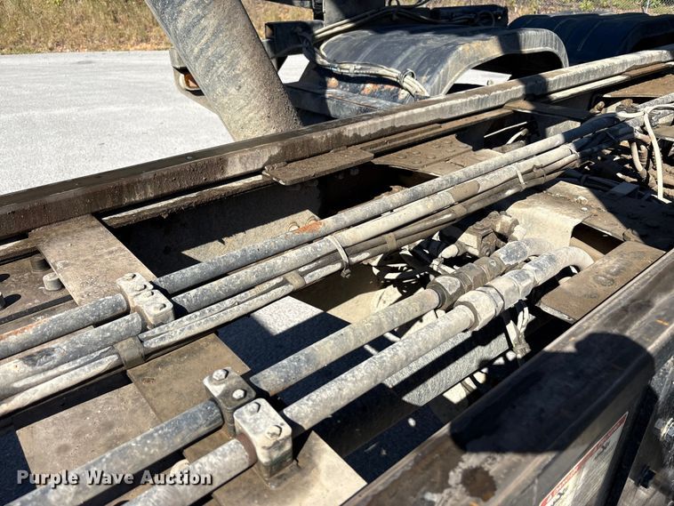 image for item EM6124 2025 Mack Granite roll-off container truck