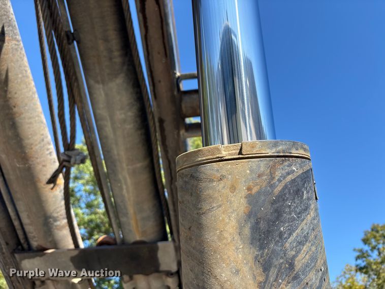 image for item EM6124 2025 Mack Granite roll-off container truck