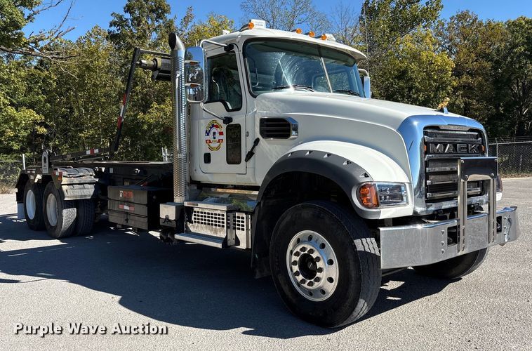 image for item EM6124 2025 Mack Granite roll-off container truck