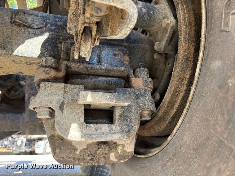 image for item EM6124 2025 Mack Granite roll-off container truck