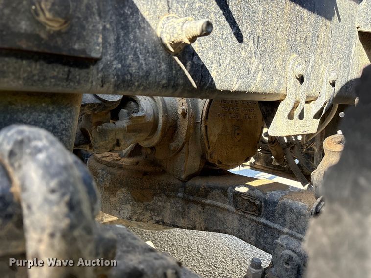 image for item EM6124 2025 Mack Granite roll-off container truck