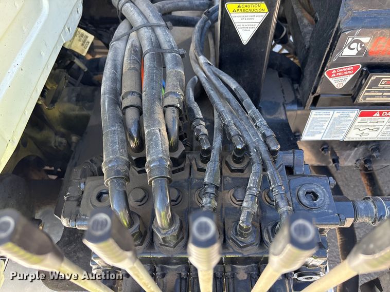 image for item EM6124 2025 Mack Granite roll-off container truck