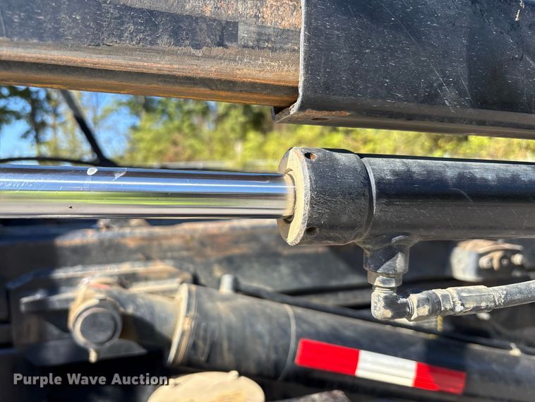 image for item EM6124 2025 Mack Granite roll-off container truck