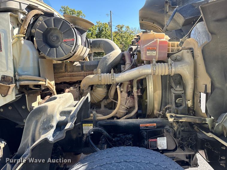 image for item EM6124 2025 Mack Granite roll-off container truck