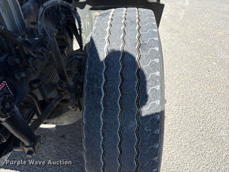 image for item EM6124 2025 Mack Granite roll-off container truck