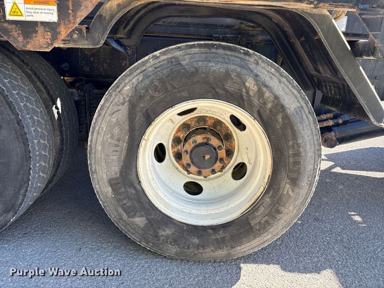 image for item EM6124 2025 Mack Granite roll-off container truck