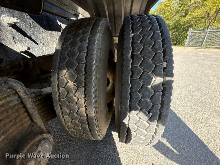 image for item EM6124 2025 Mack Granite roll-off container truck