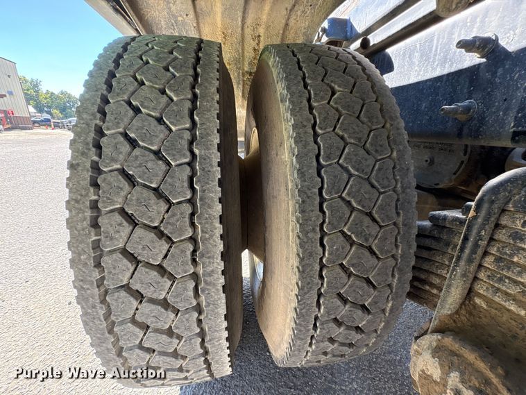 image for item EM6124 2025 Mack Granite roll-off container truck