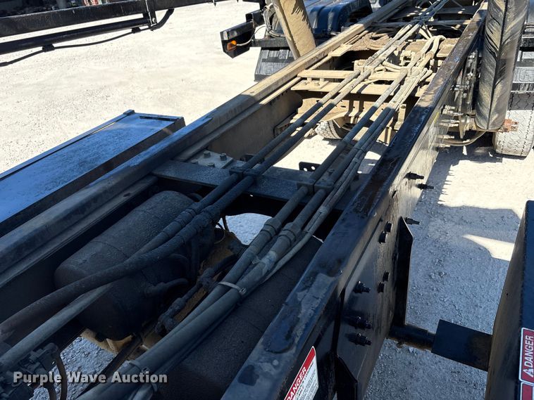 image for item EM6126 2025 Mack Granite roll-off container truck