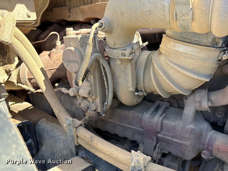 image for item EM6126 2025 Mack Granite roll-off container truck