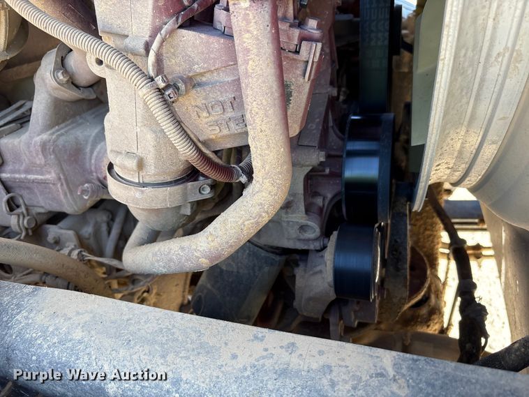 image for item EM6126 2025 Mack Granite roll-off container truck