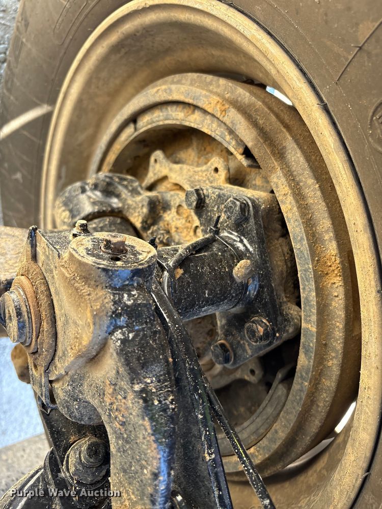 image for item EM6126 2025 Mack Granite roll-off container truck