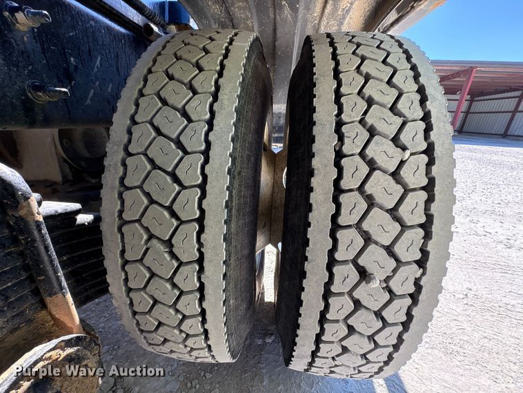 image for item EM6126 2025 Mack Granite roll-off container truck