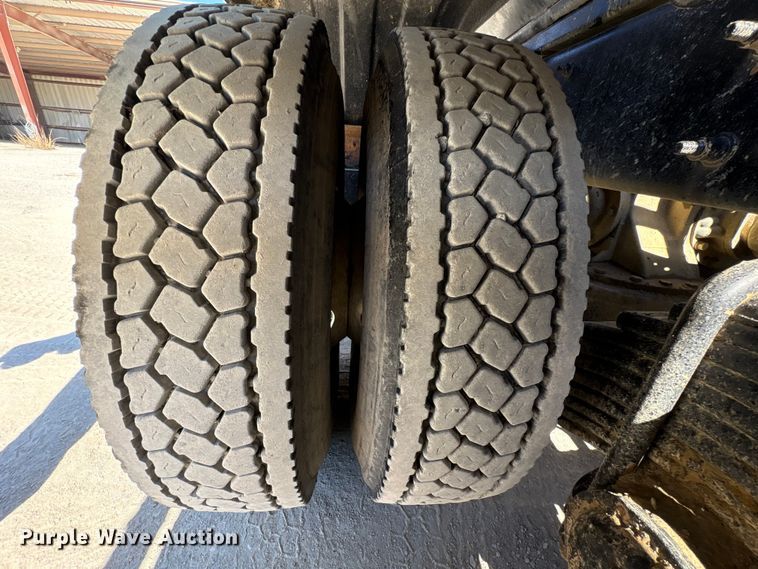 image for item EM6126 2025 Mack Granite roll-off container truck