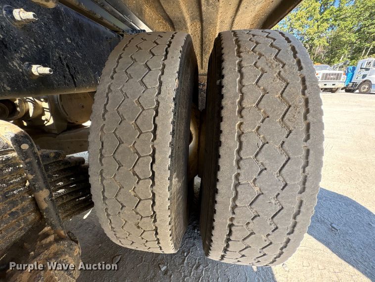 image for item EM6126 2025 Mack Granite roll-off container truck