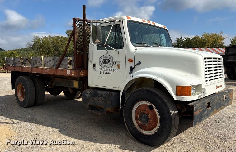 image for item ET7109 1990 International 4700 dump flatbed truck