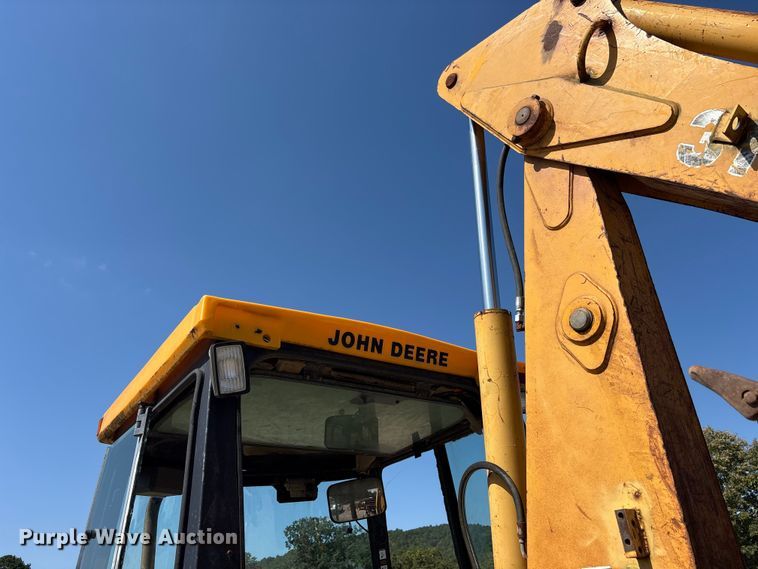 image for item ET7114 1992 John Deere 310D backhoe