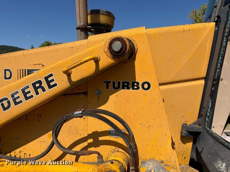 image for item ET7114 1992 John Deere 310D backhoe