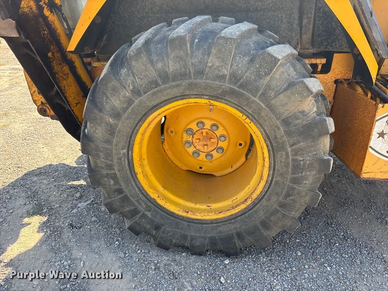 image for item ET7114 1992 John Deere 310D backhoe