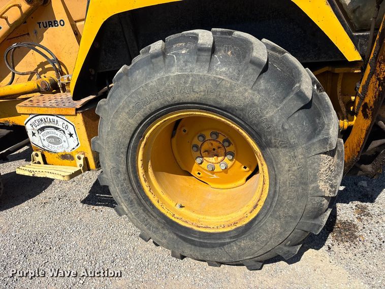 image for item ET7114 1992 John Deere 310D backhoe