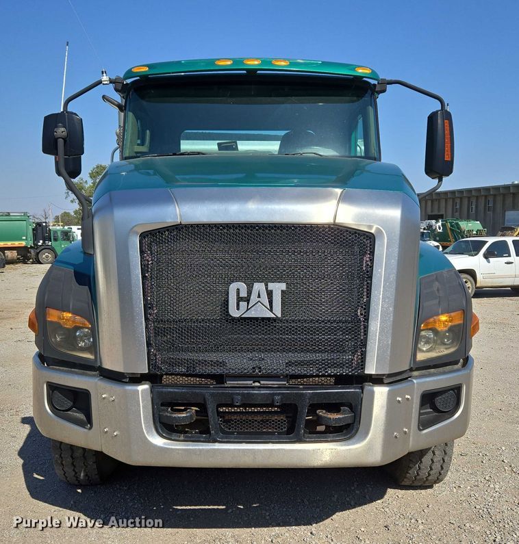 image for item EU5143 2016 Caterpillar CF7AA roll-off container truck