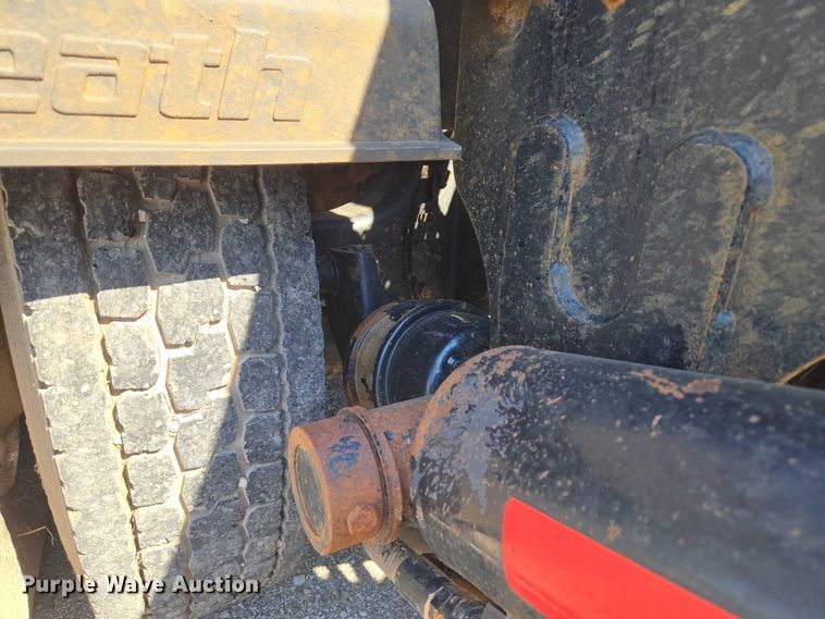 image for item EU5143 2016 Caterpillar CF7AA roll-off container truck