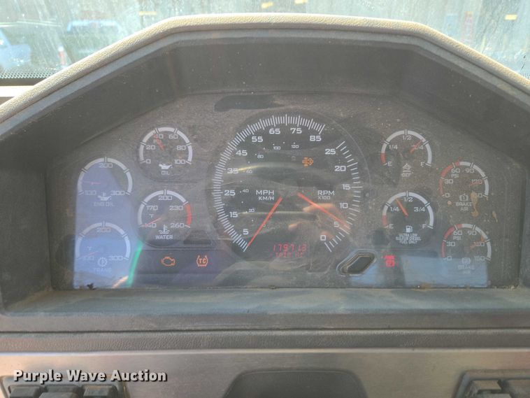 image for item EU5143 2016 Caterpillar CF7AA roll-off container truck