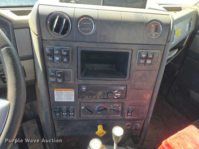 image for item EU5143 2016 Caterpillar CF7AA roll-off container truck