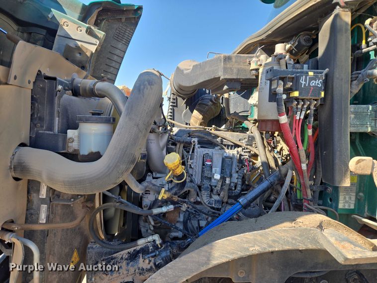 image for item EU5143 2016 Caterpillar CF7AA roll-off container truck