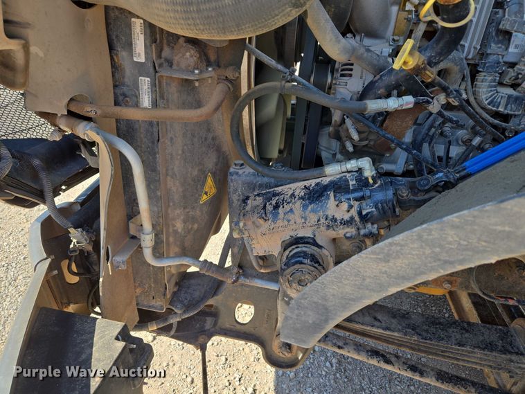 image for item EU5143 2016 Caterpillar CF7AA roll-off container truck