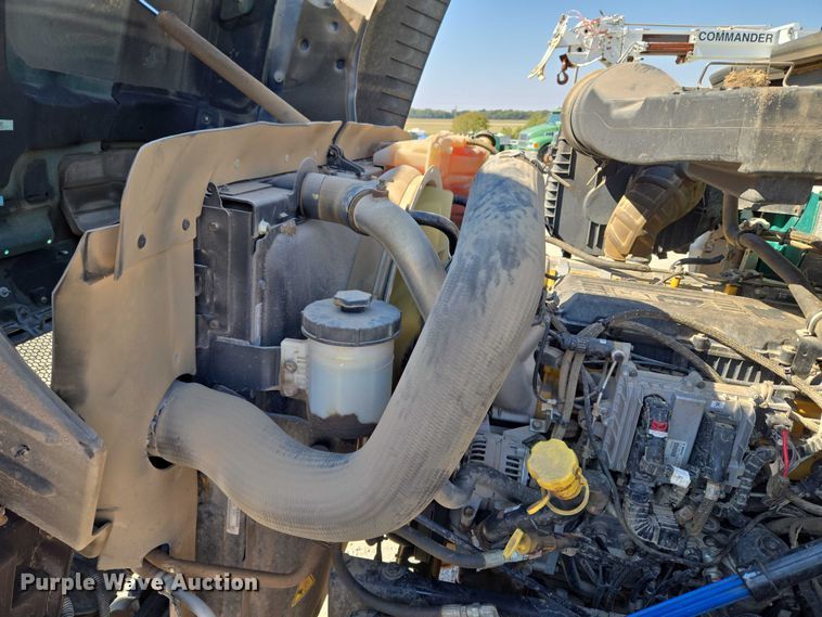 image for item EU5143 2016 Caterpillar CF7AA roll-off container truck