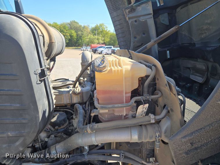 image for item EU5143 2016 Caterpillar CF7AA roll-off container truck