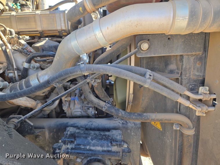 image for item EU5143 2016 Caterpillar CF7AA roll-off container truck