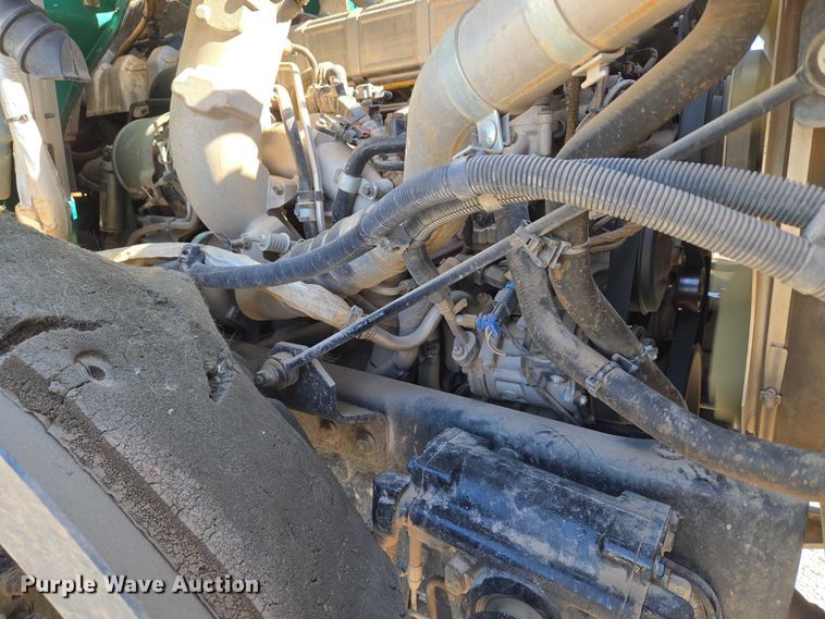 image for item EU5143 2016 Caterpillar CF7AA roll-off container truck