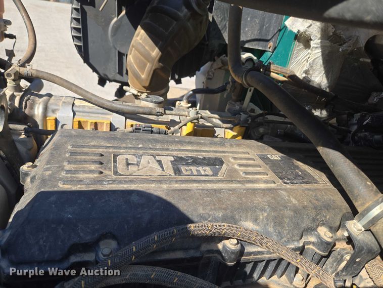 image for item EU5143 2016 Caterpillar CF7AA roll-off container truck