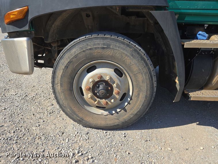 image for item EU5143 2016 Caterpillar CF7AA roll-off container truck