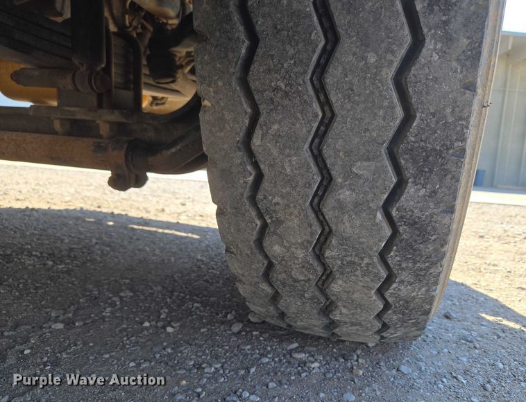 image for item EU5143 2016 Caterpillar CF7AA roll-off container truck