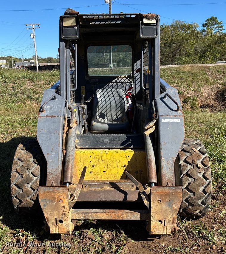 MINI CARGADOR SOBRE RUEDAS 2000 NEW HOLLAND LS180