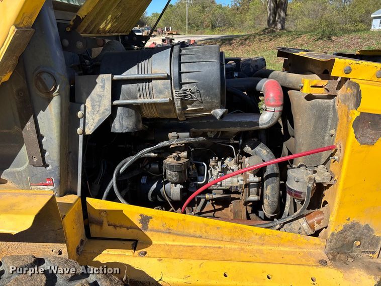 image for item EV3217 2000 New Holland LS180 skid steer loader