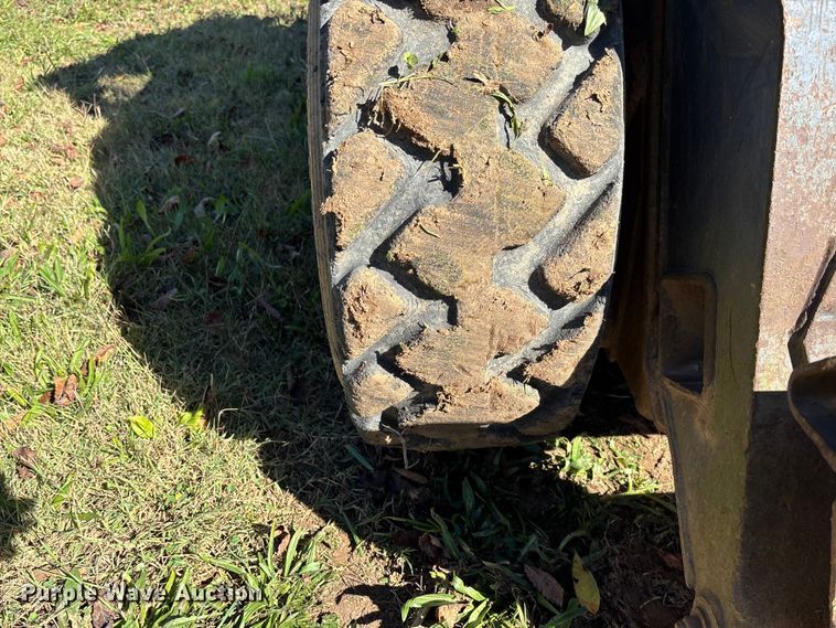 image for item EV3217 2000 New Holland LS180 skid steer loader