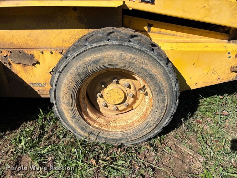 image for item EV3217 2000 New Holland LS180 skid steer loader