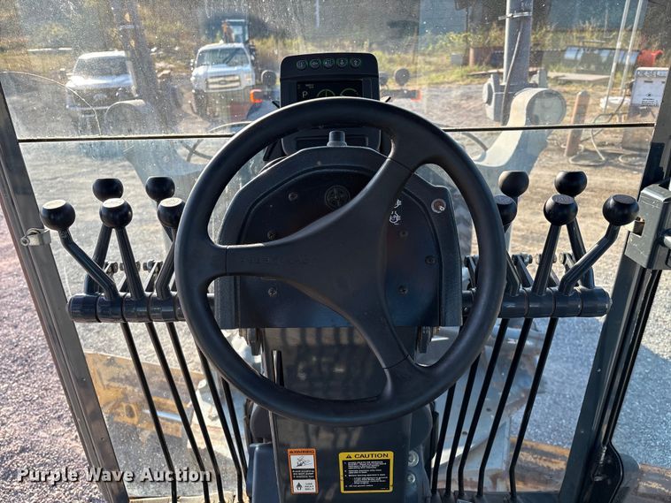 image for item IE9238 2009 John Deere 670G motor grader